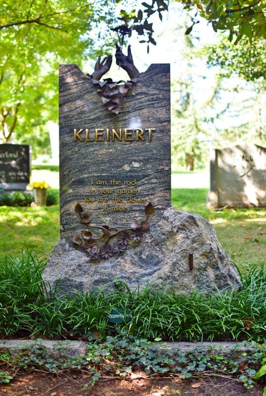 Kleinert Variegated Granite Boulder Memorial with Bronze Art an Letters